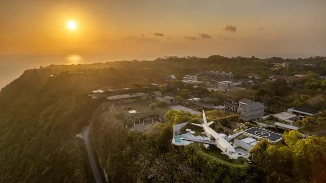 The villa from the air as the sun goes down