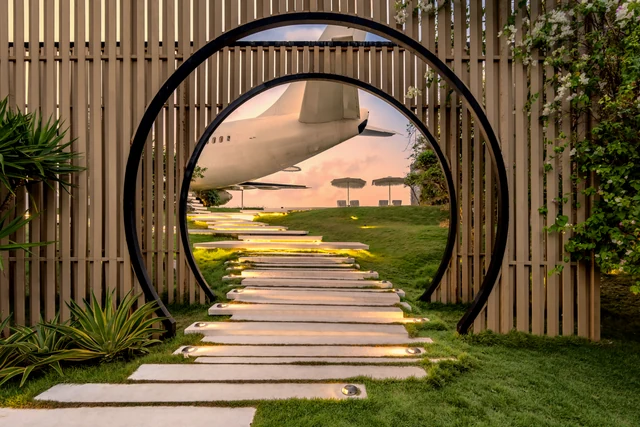 The moon gate, with the aircraft behind it